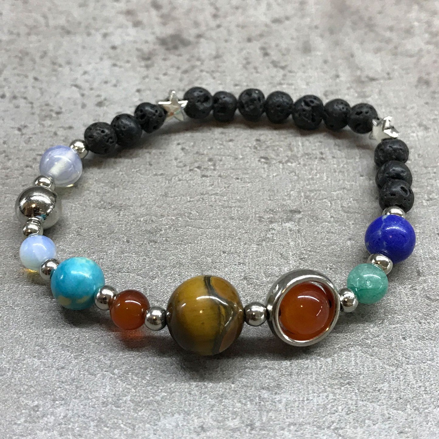 Bracelet en pierre de lave - Système solaire argenté